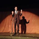 My favourite part is his business suit/crumpled winter boot combo.